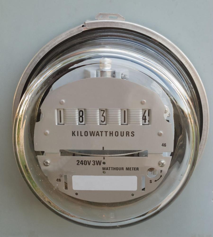 Electric meter showing 18,314 kilowatt hours